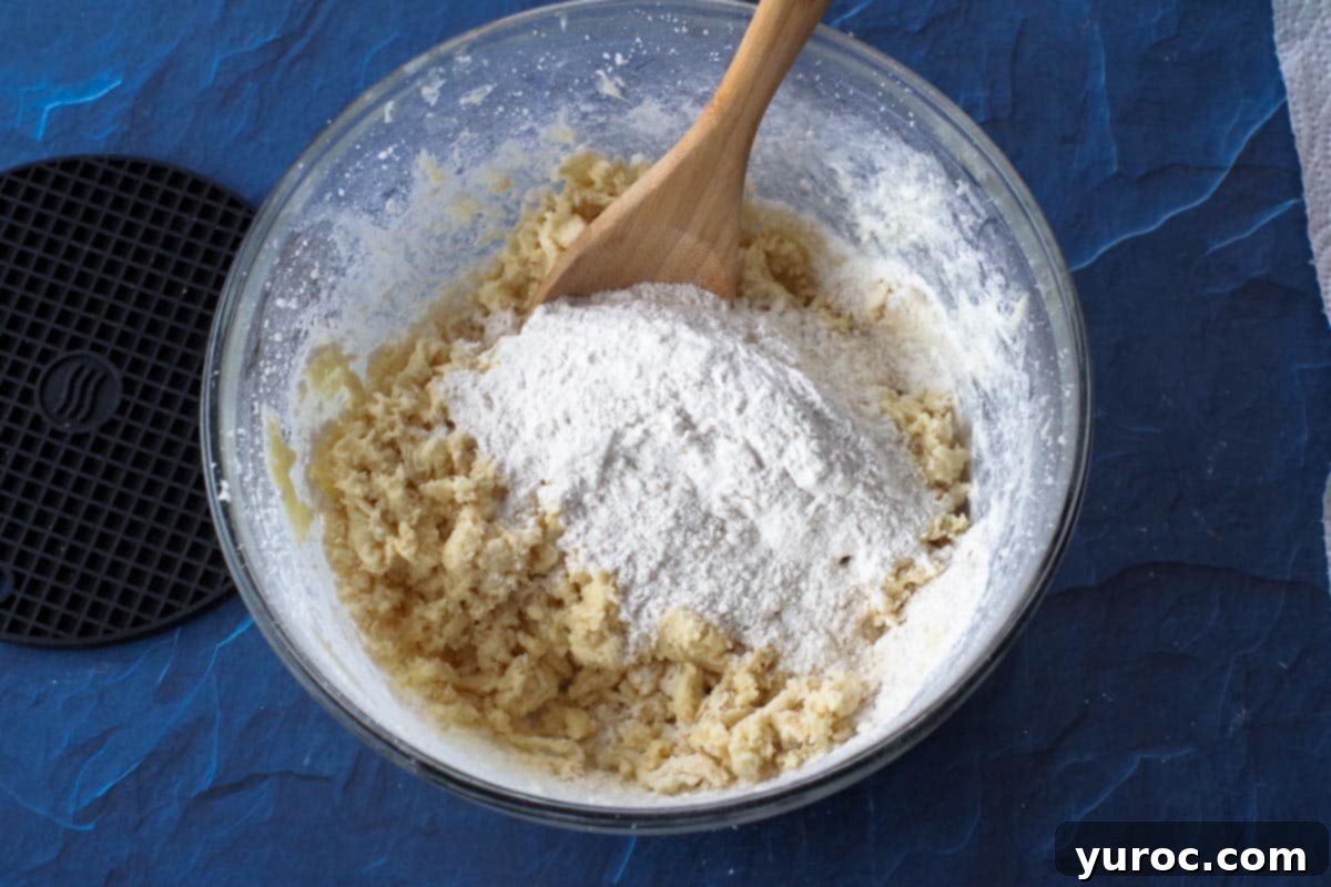 stir in remaining flour with wooden spoon
