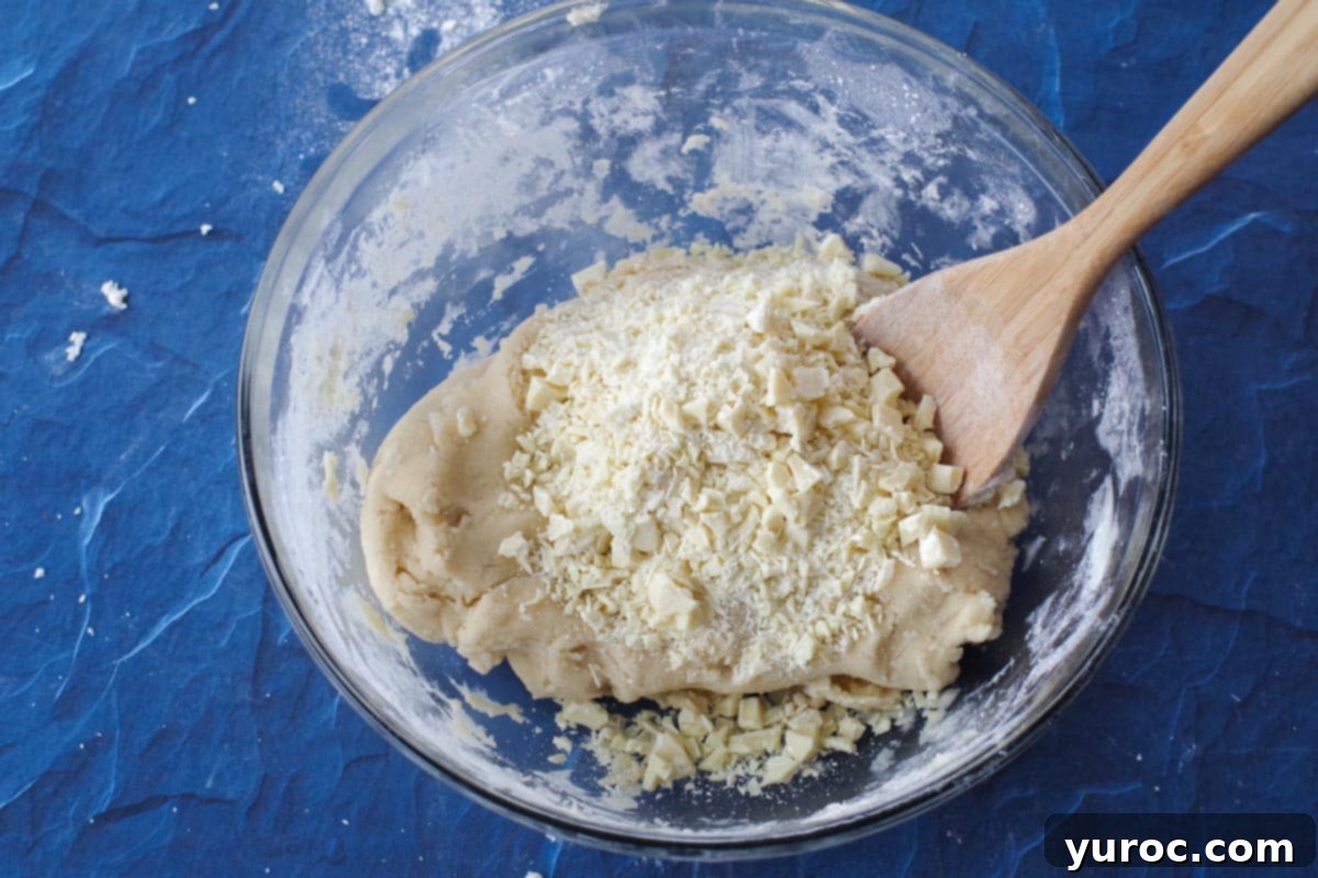 cookie dough with white chocolate pieces added.