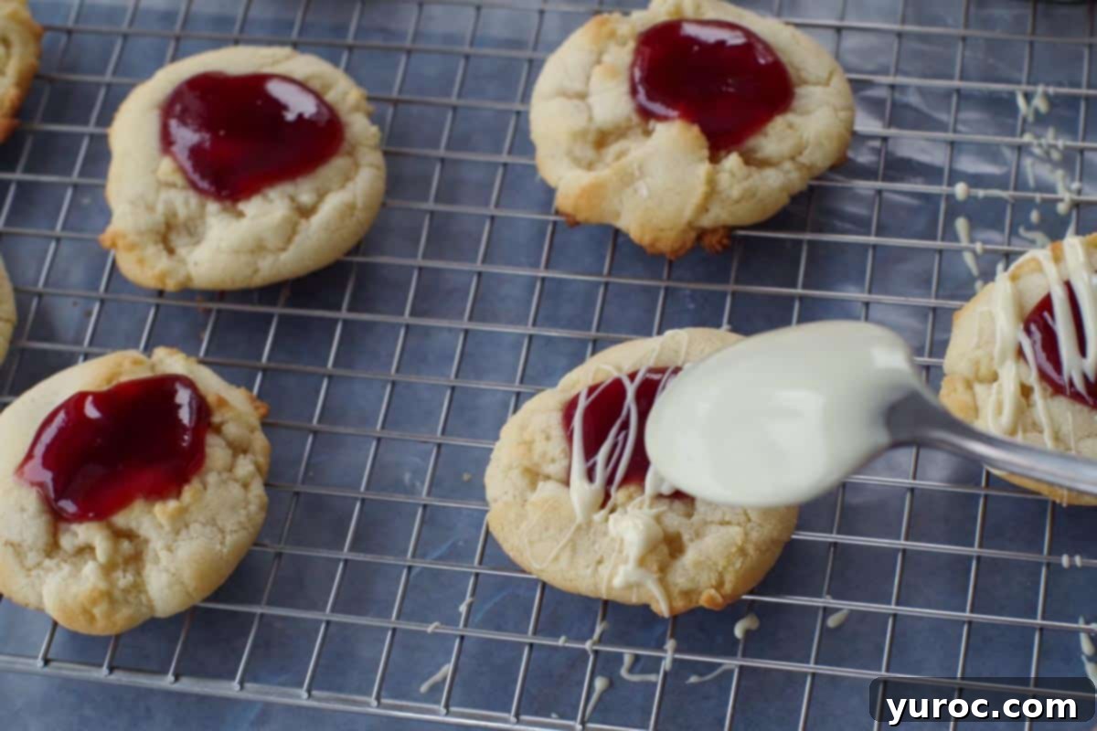 cookies being drizzled with melted mixture