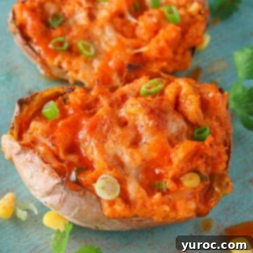 2 twice baked sweet potatoes on a blue surface
