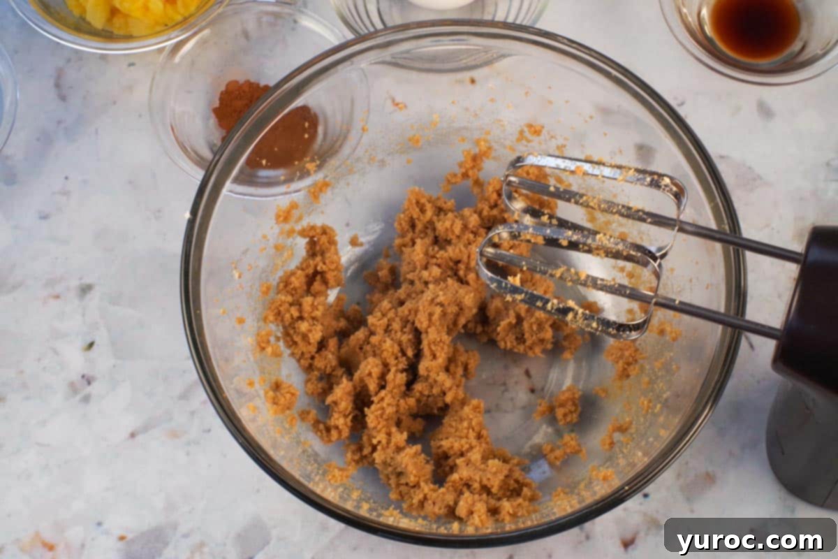 Butter and sugar beaten together with electric mixer in large bowl. 