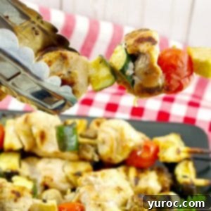 kabob being held with tongs