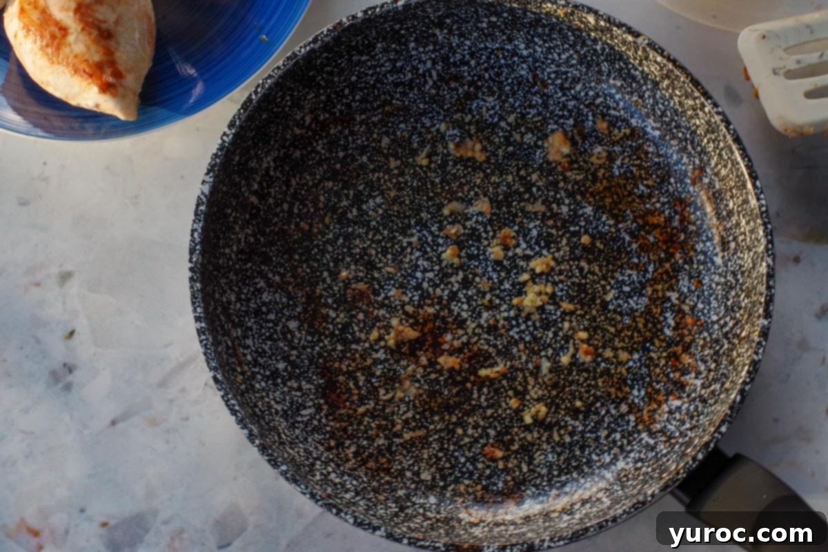 Sticky Orange Hoisin Chicken 8 Minced garlic sizzling in a hot skillet for 1 minute