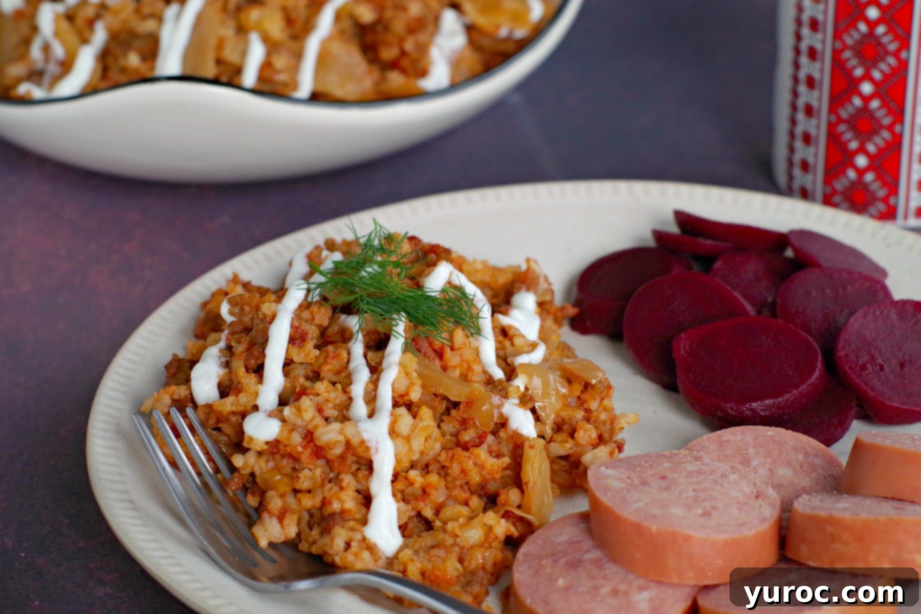 lazy slow cooker cabbage rolls on plate with kielbasa and beets