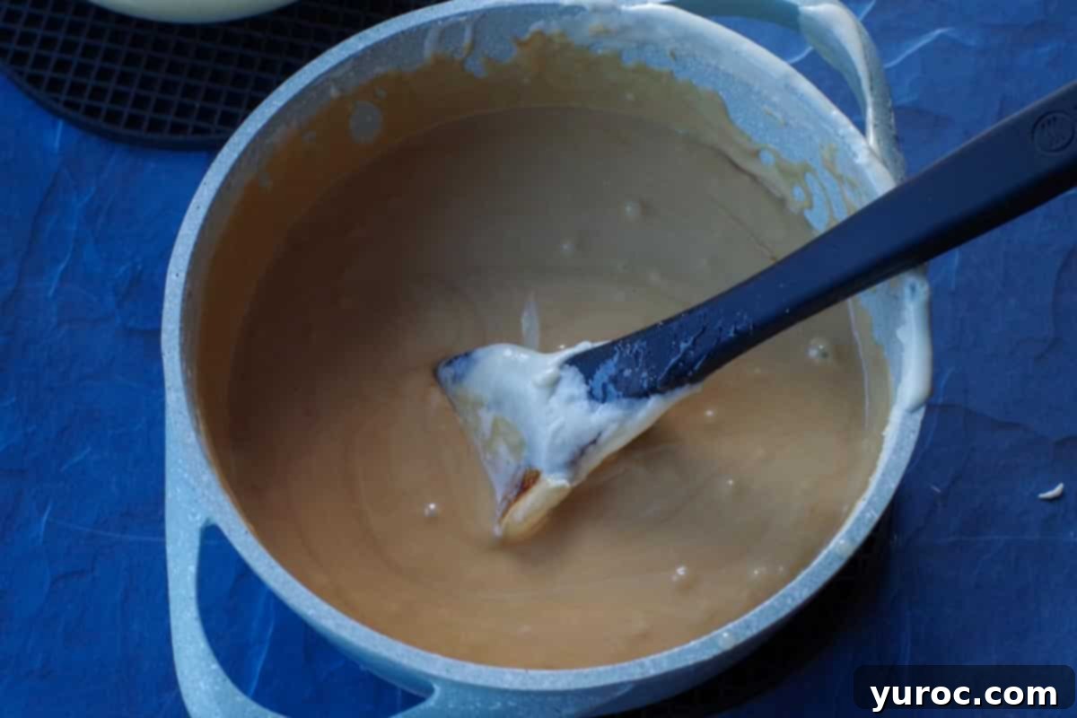 root beer concentrate stirred into remaining mixture