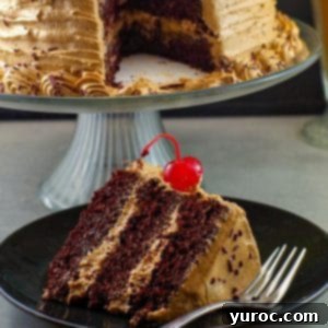 piece of root beer float cake in foreground with remainder of cake in background