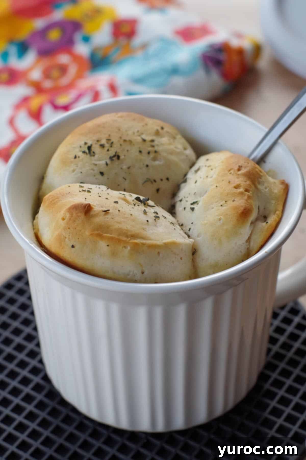 personal chicken pot pie in a white meal mug with a spoon