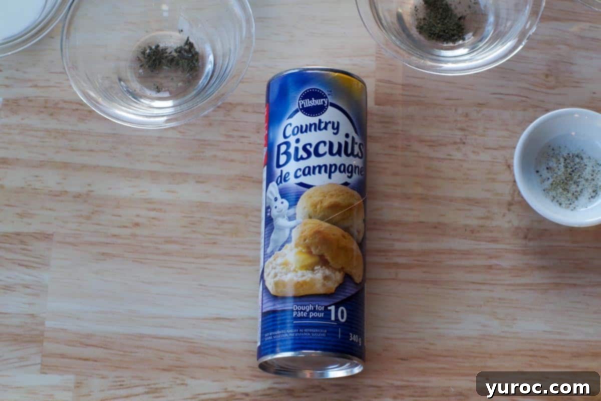 tube of country biscuits with jars of other ingredients in dishes