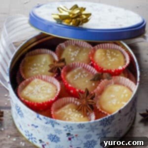 Decadent Salted Soft Butter Toffee 13 Soft salted butter toffee in little red paper cups, ready for serving or gifting, featured in the recipe card.