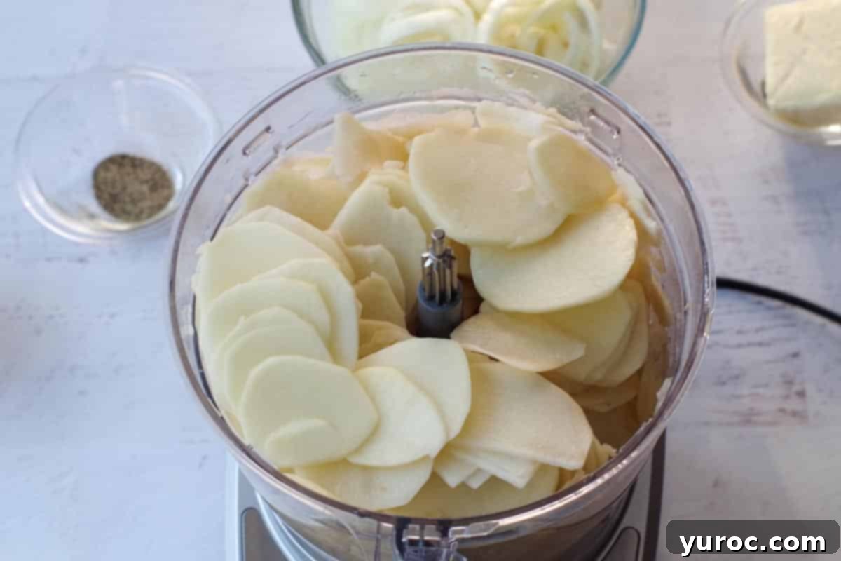 potatoes sliced in a food processor