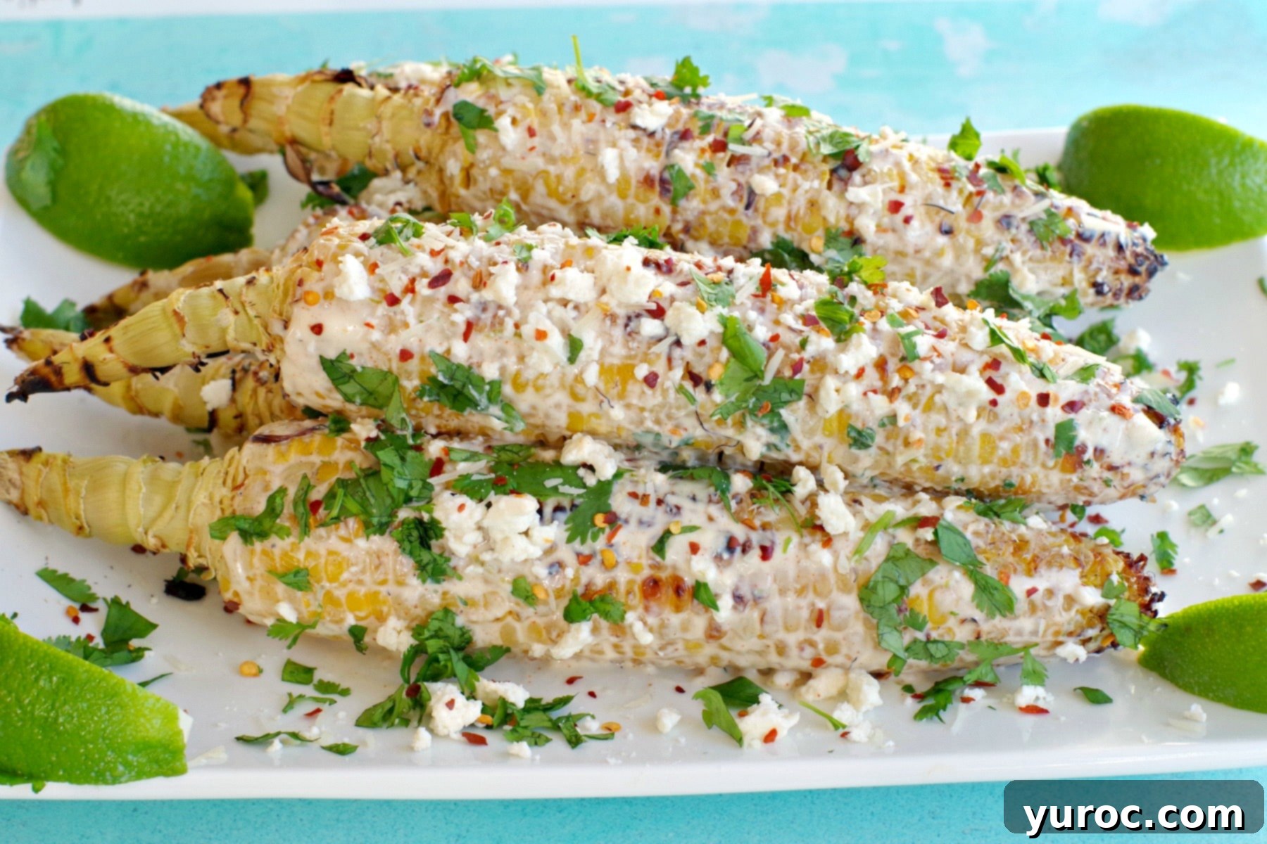 mexican street corn piled on white platter