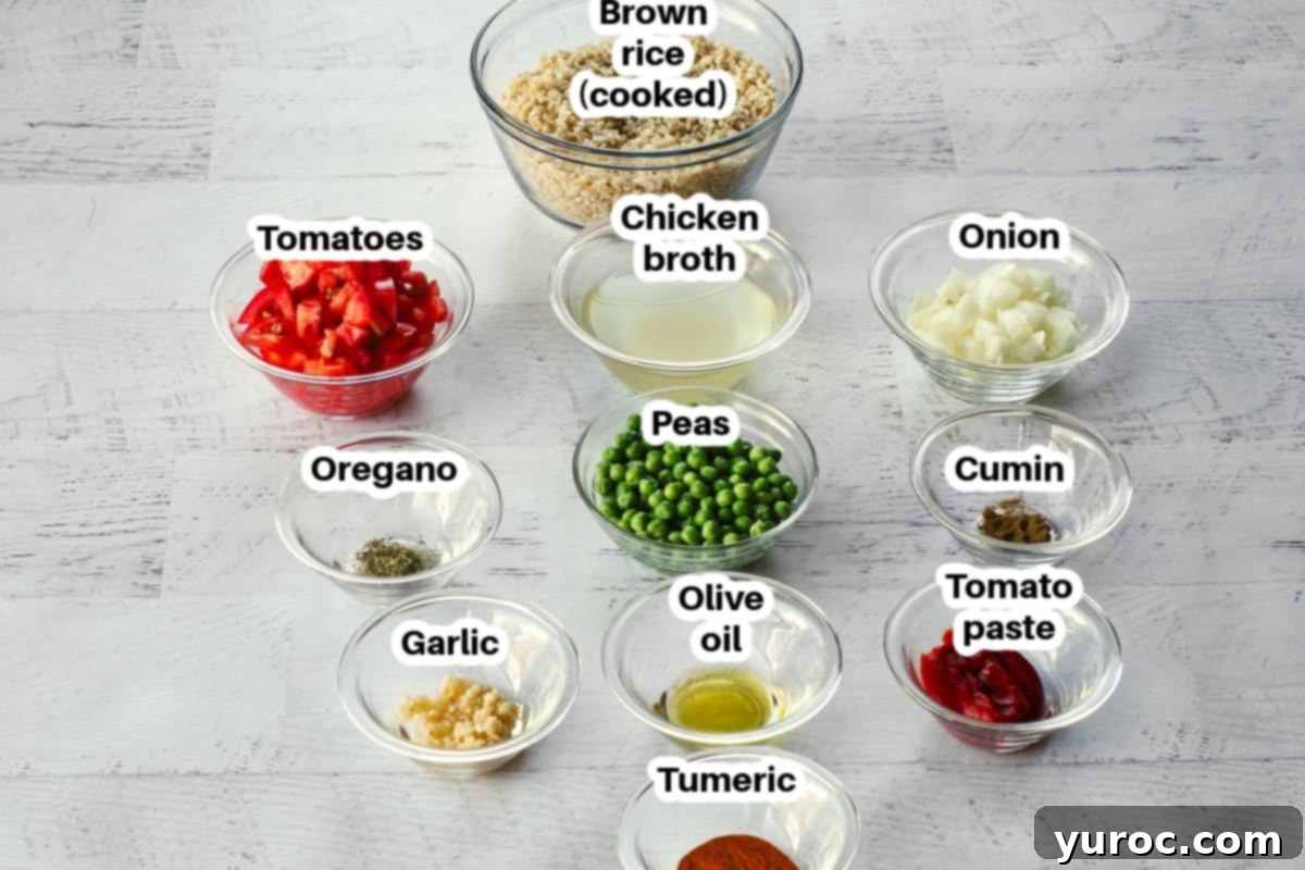 ingredients in brown spanish rice, in glass bowls, labelled