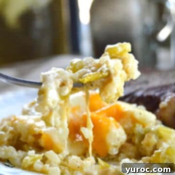 What to Serve with Carnitas: 25 Irresistible Recipes 12 A spoonful of Green Chile Cauliflower Casserole showing its creamy, cheesy texture.
