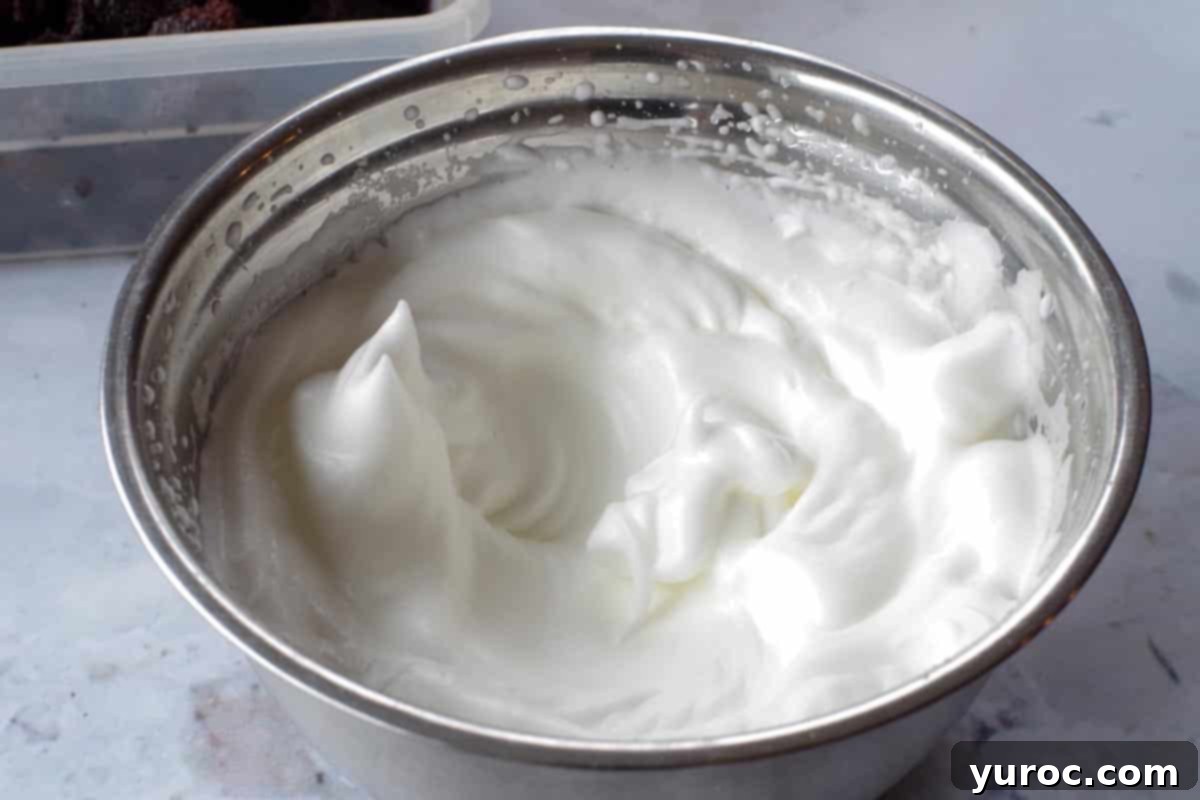 Kahlua-Spiked Death by Chocolate Trifle 5 egg whites beaten until stiff in a metal bowl