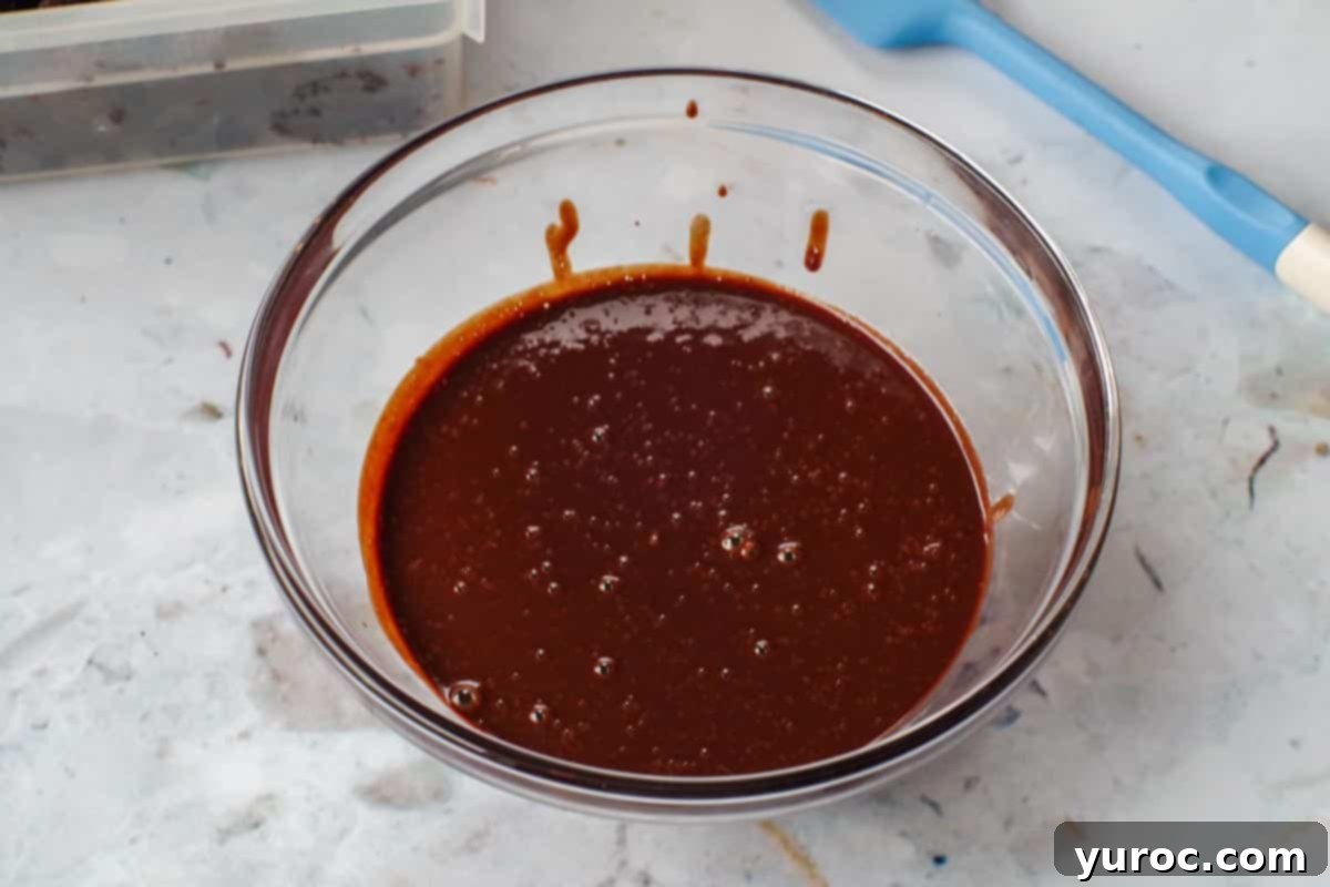 Kahlua-Spiked Death by Chocolate Trifle 7 chocolate chips, boiling water and kahlua beaten until smooth