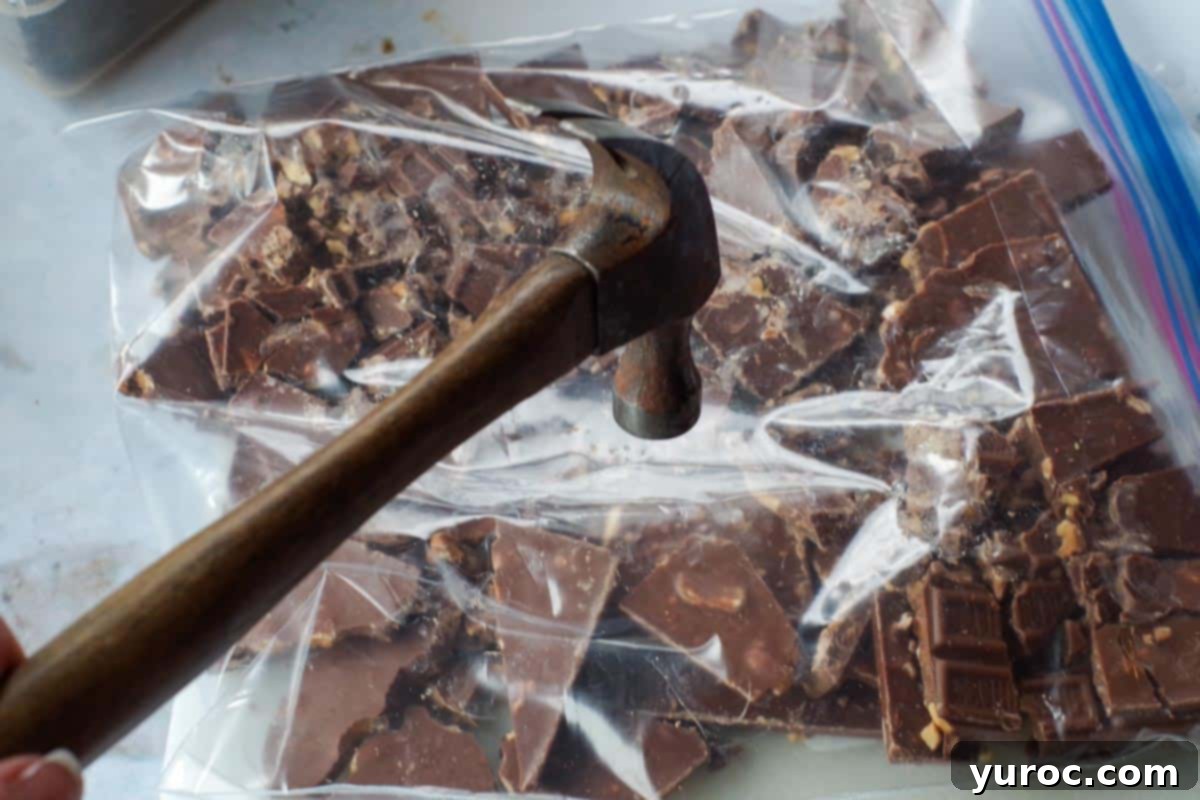 Kahlua-Spiked Death by Chocolate Trifle 9 hammer hitting Skor bars in ziploc bag