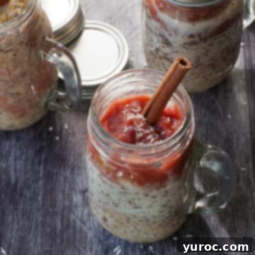 rhubarb overnight oats in a jar with 2 other jars in the background