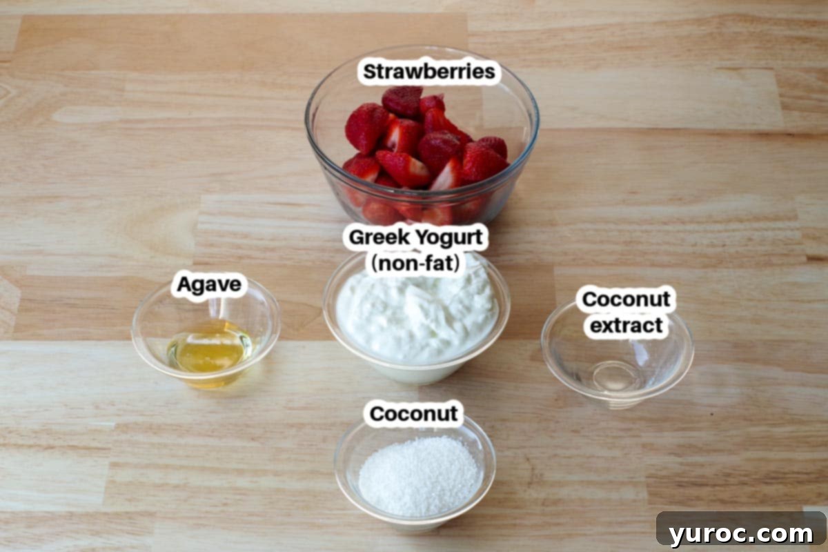 Individual glass dishes showcase the fresh ingredients for Strawberry Yogurt Popsicles, clearly labeled for easy identification.