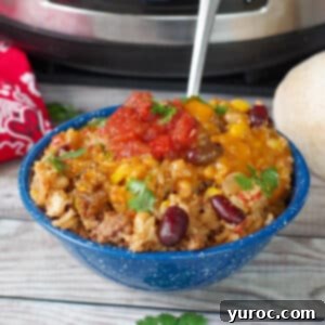 a bowl of cowboy casserole in front of a crock pot