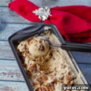 Effortless Butter Tart Dream Ice Cream 18 Creamy butter tart ice cream being scooped from a loaf pan, with a festive red napkin and maple leaf ring in the background, tempting viewers to try this Canadian dessert.
