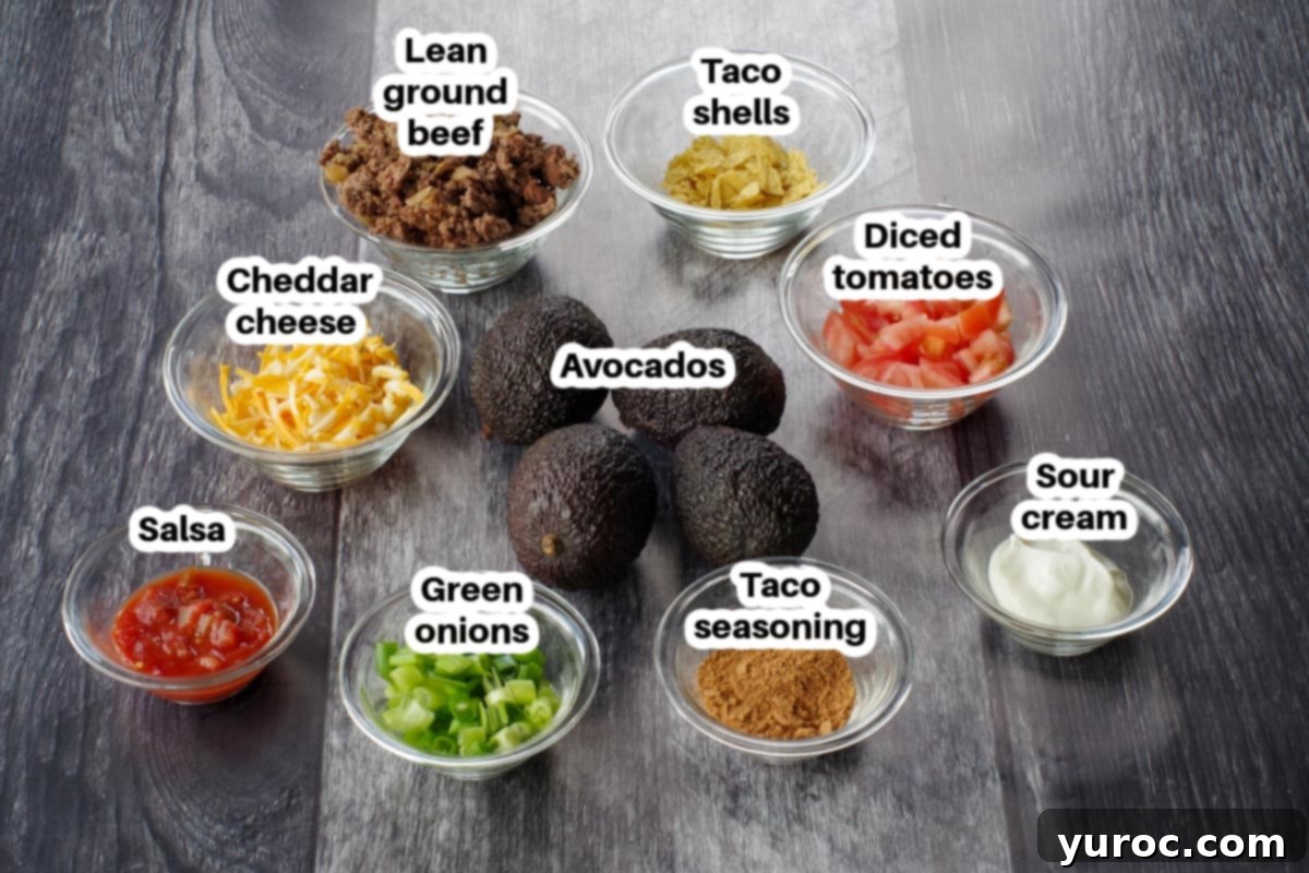 Various avocado taco ingredients meticulously arranged in clear glass dishes, each labeled for easy identification