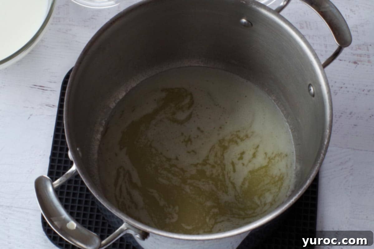 Silky Light Chicken Fettuccine 4 Melted butter in a large pot on the stove.