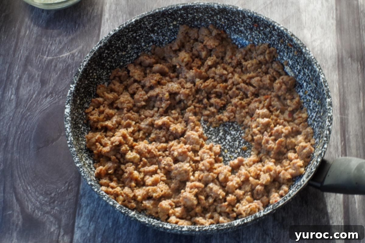 turkey sausage browned in a frying pan