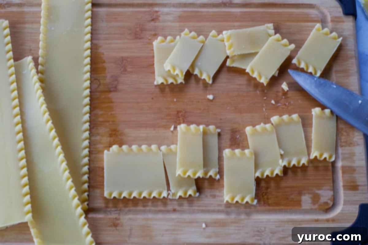 Soaked and dried lasagna noodles sliced into even, bite-sized pieces