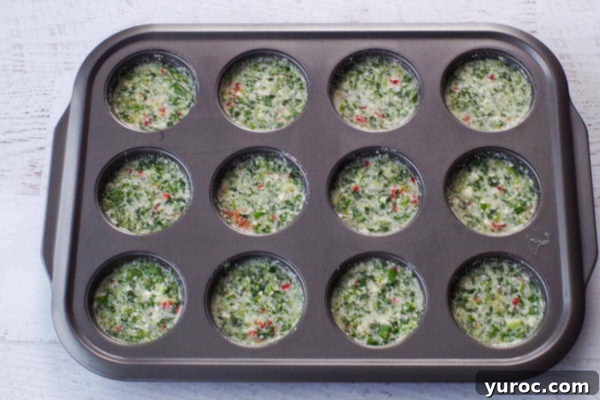 Vibrant Roasted Red Pepper Egg White Bites 7 Egg mixture poured into muffin tin to ¾ full