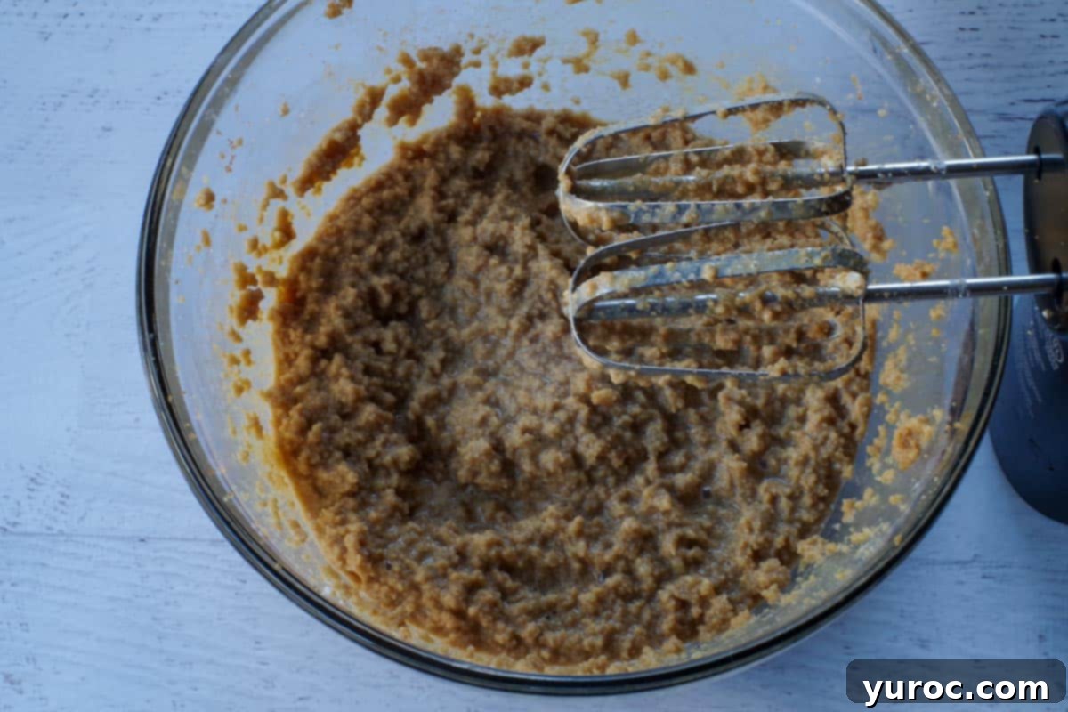 Butter flavor, eggs, and whipping cream beaten into the butter/sugar mixture