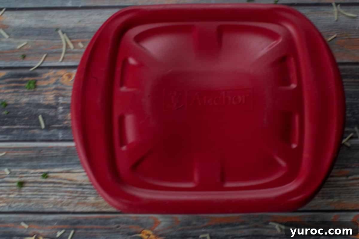 container with red lid