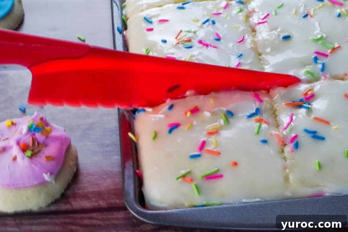 sugar cookie sheet pan pancakes being cut into 12 pieces