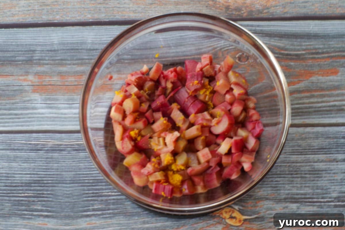 cooked rhubarb with orange zest in a glass bolw