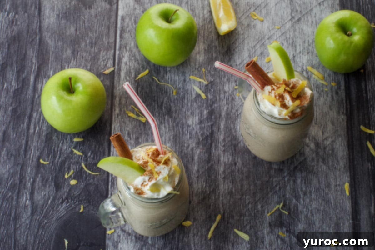 Wholesome Apple Pie Spice Blend 9 A single healthy apple pie smoothie, beautifully garnished with an apple slice and cinnamon, ready to be enjoyed.