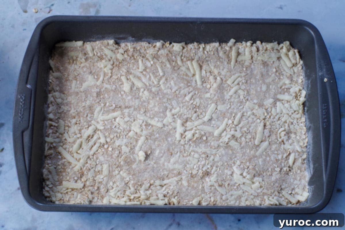 Saskatoon Berry Bliss Bars 10 (half the mixture) base spread onto the bottom of the prepared 9x13 pan