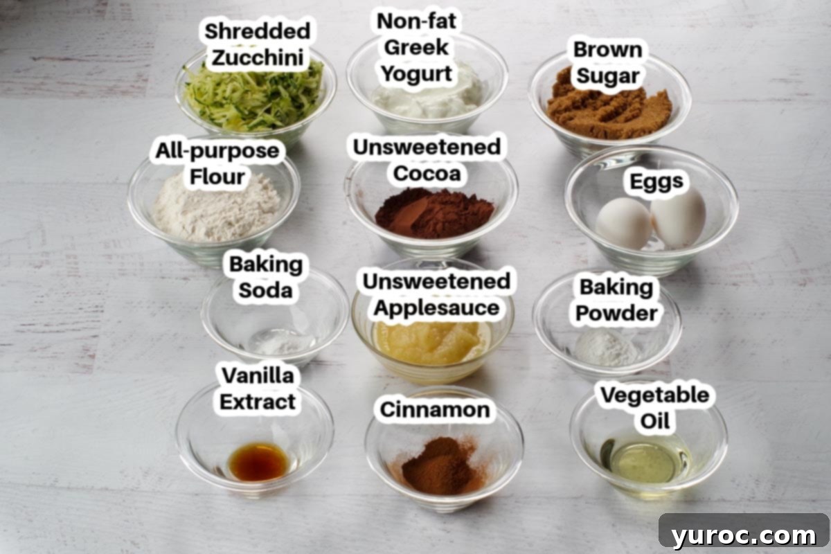 Labeled ingredients in glass bowls for Weight Watchers Zucchini Muffins