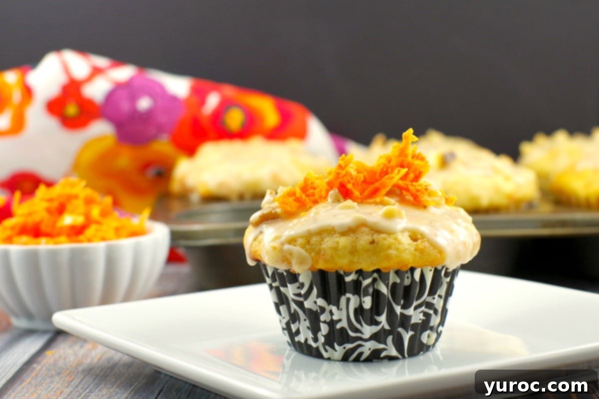 Glazed Carrot Cake Doughnut Muffins 2 Carrot Cake Doughnut Muffins with orange mocha glaze and candied carrots