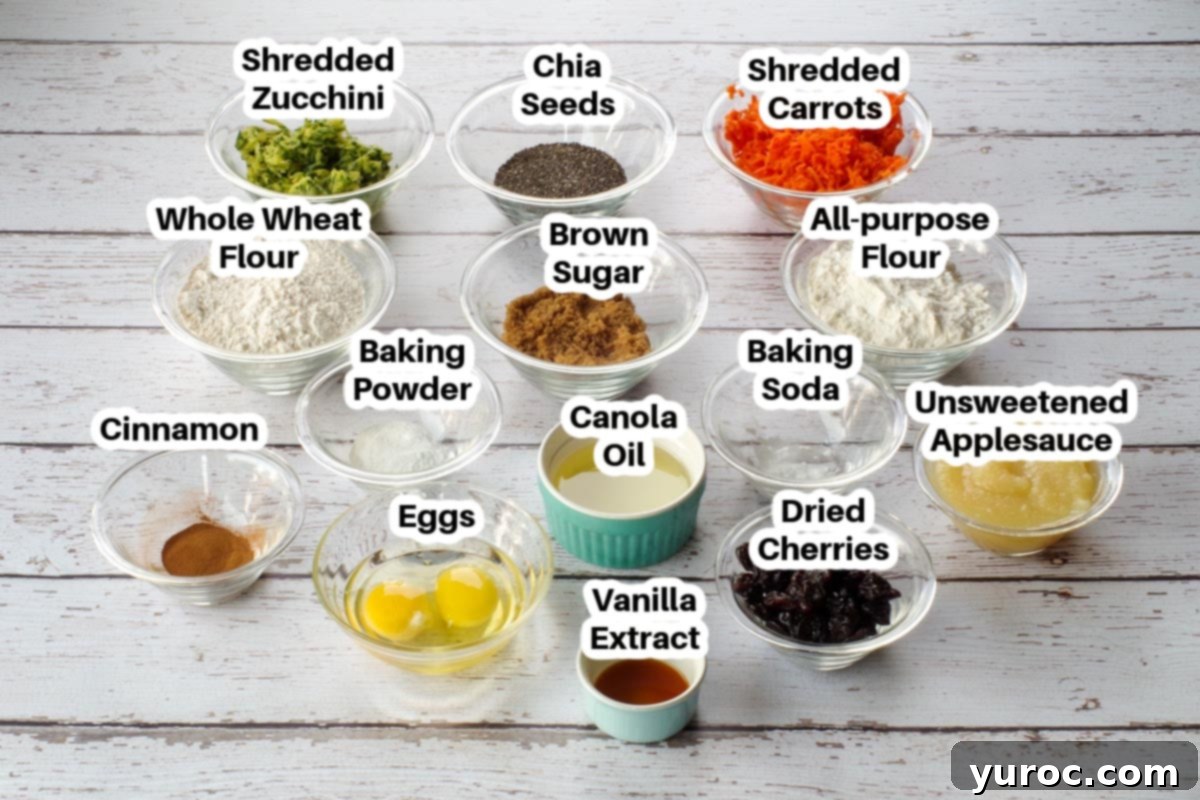 A collection of healthy zucchini bar ingredients displayed in individual glass bowls, clearly labelled for easy identification.