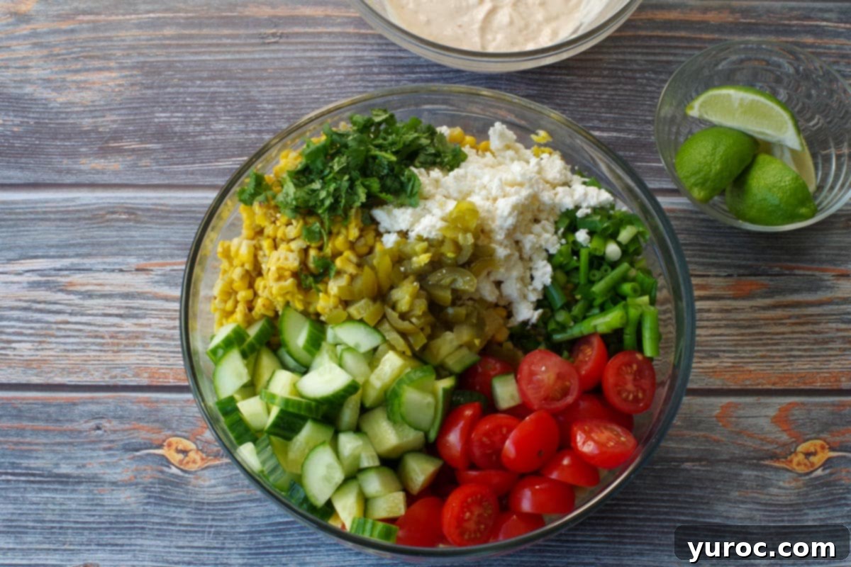 salad ingredients in large glass bowl