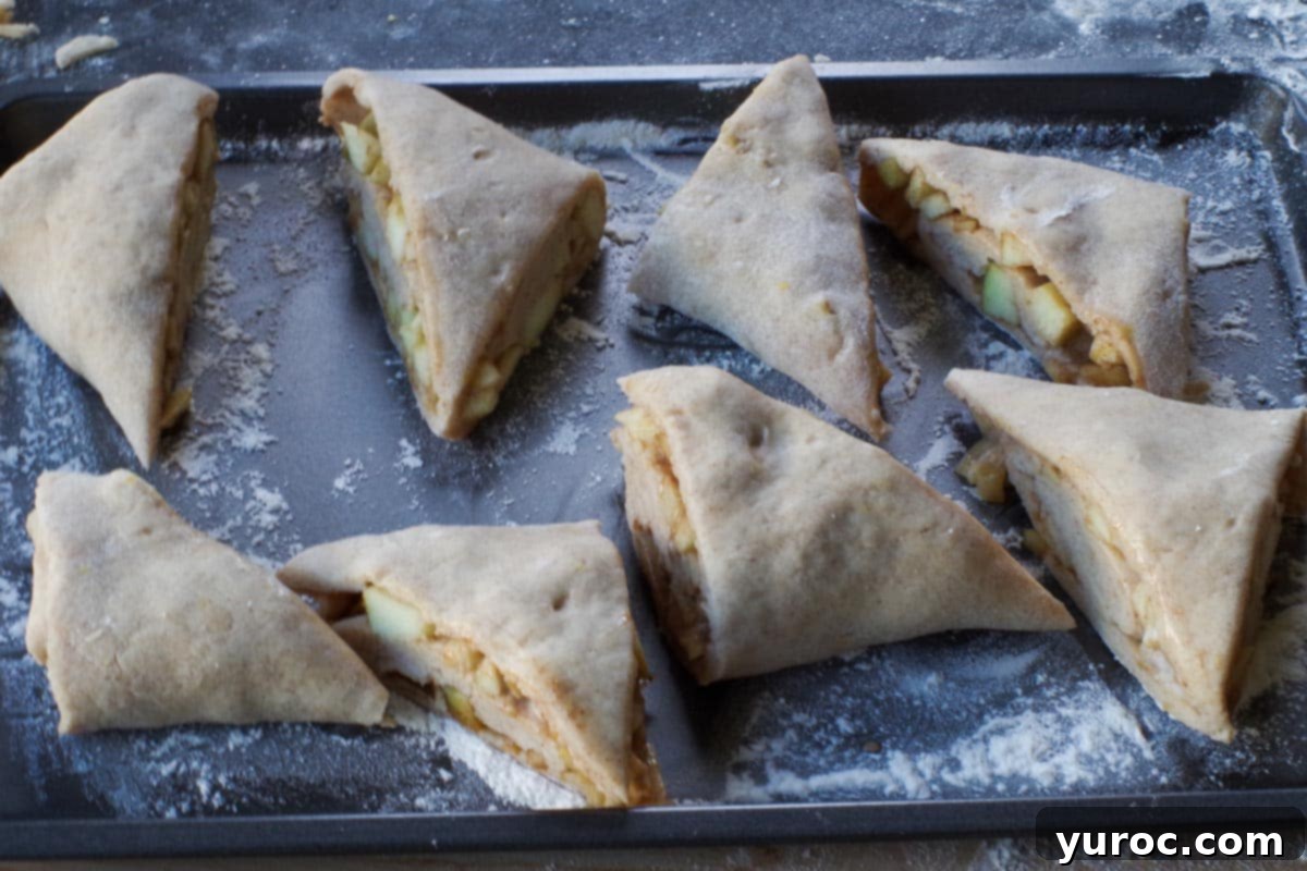 Scones transferred to a floured plate or baking sheet prior to freezing