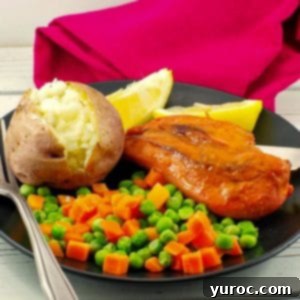 Bonanza Monterey chicken on plate with baked potato and mixed vegetables