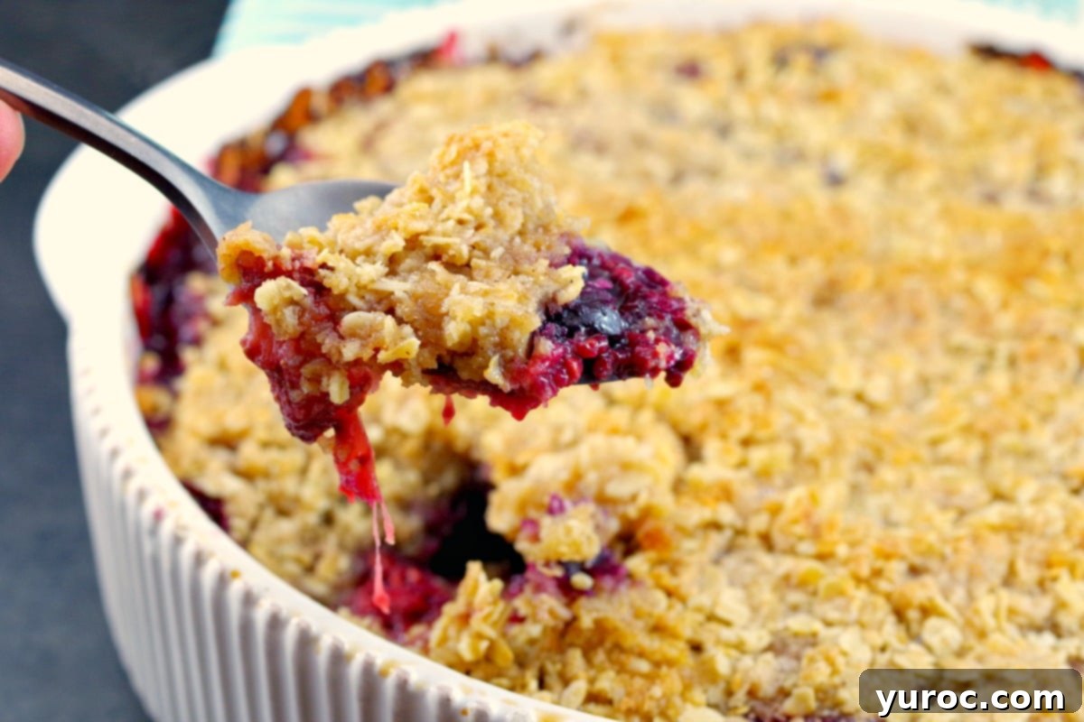 Easy Berry Crumble with frozen mixed berries | and with lemon, mint and coconut - foodmeanderings.com