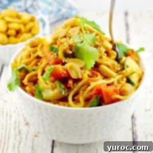 Leftover Spaghetti Peanut Salad 9 Spicy Vegan Peanut Pasta Salad in bowl with bowl of peanuts in the backgaorun