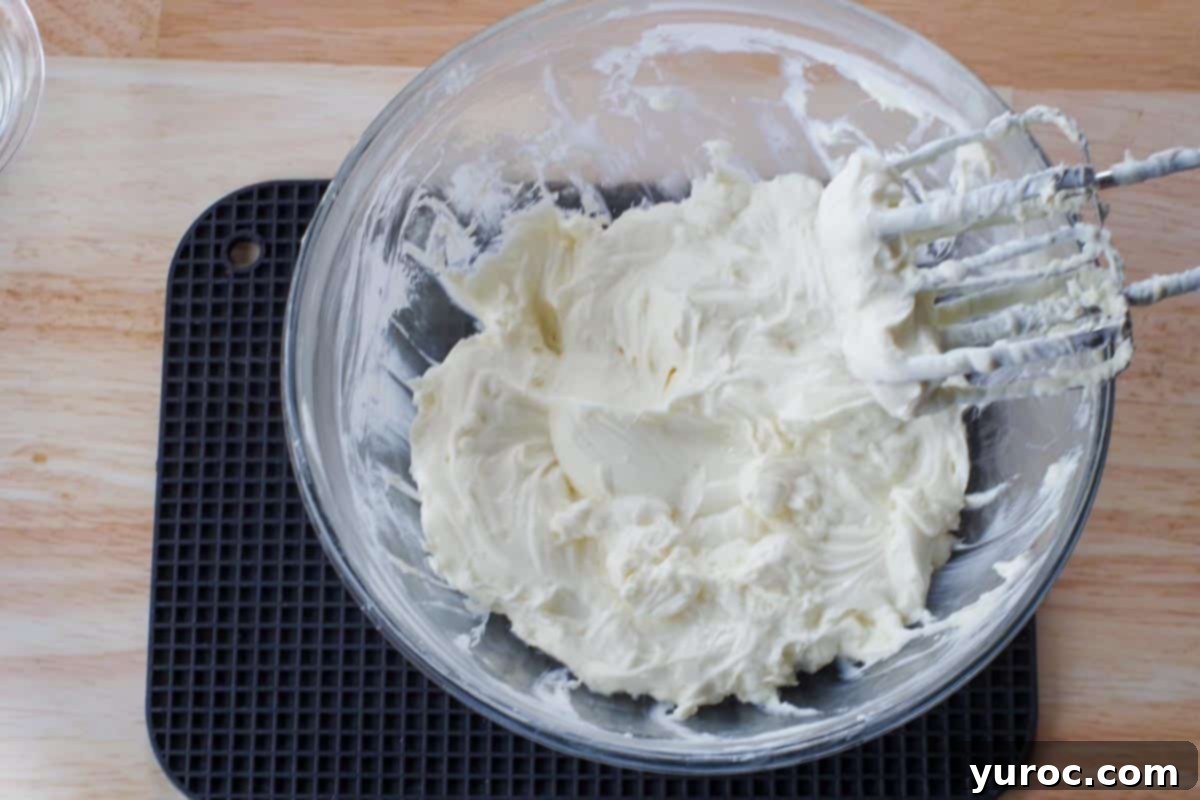 sour cream beaten into cream cheese mixture