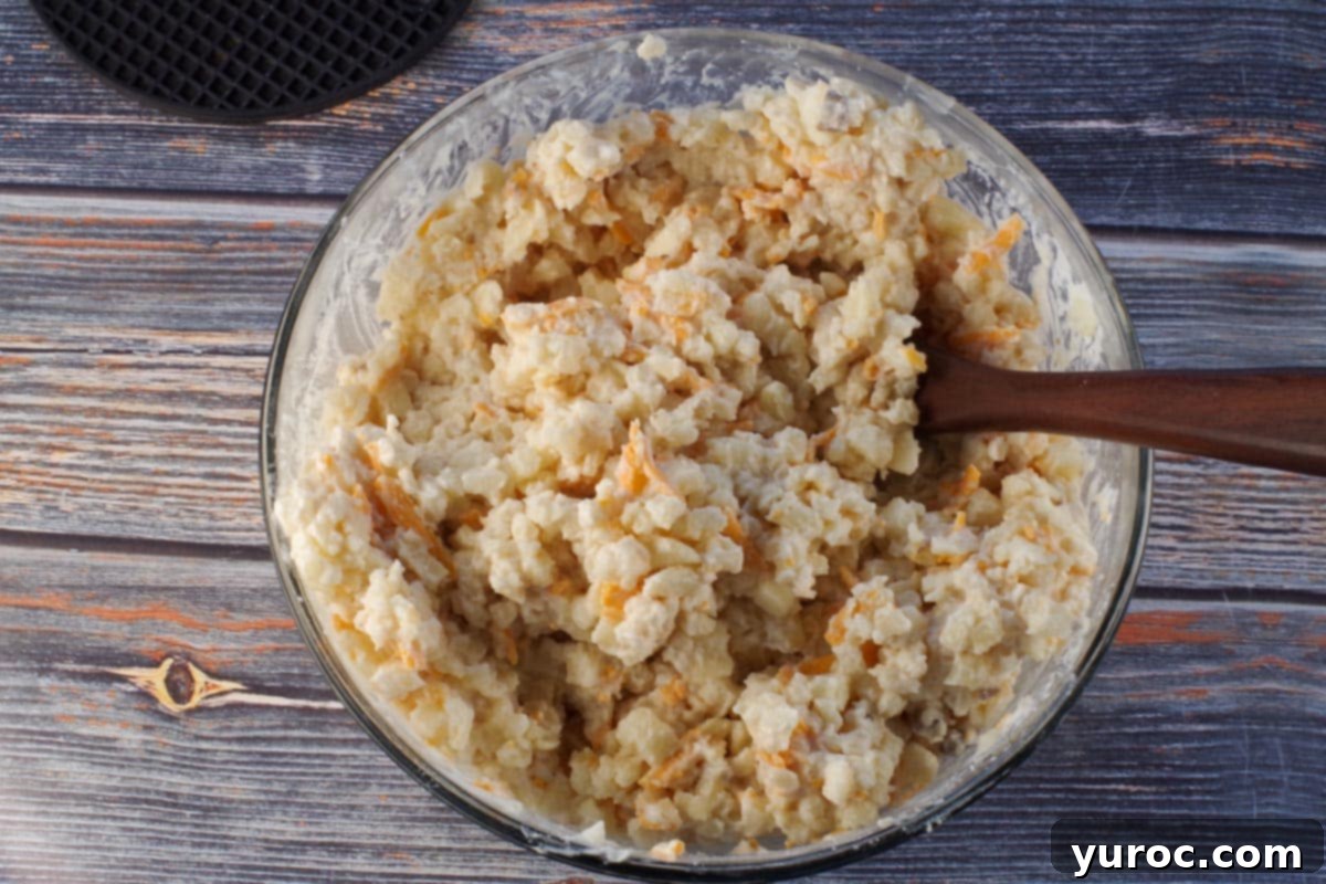 Remaining ingredients mixed together in large glass bowl with dark wooden spoon