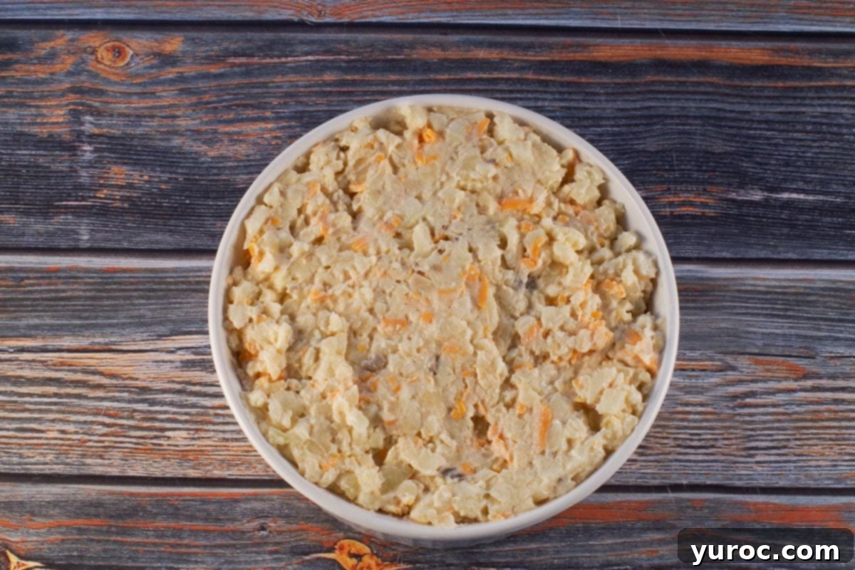 hash brown casserole in white casserole dish