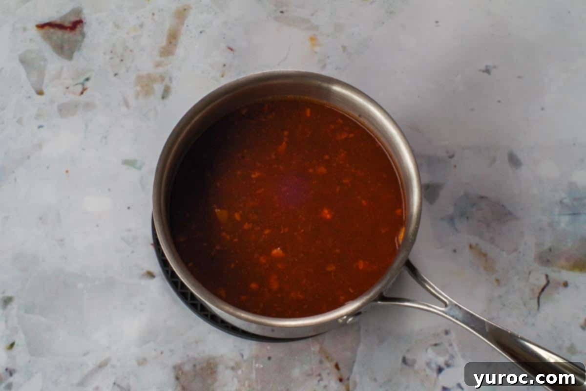 Sauce from slow cooker in a saucepan.