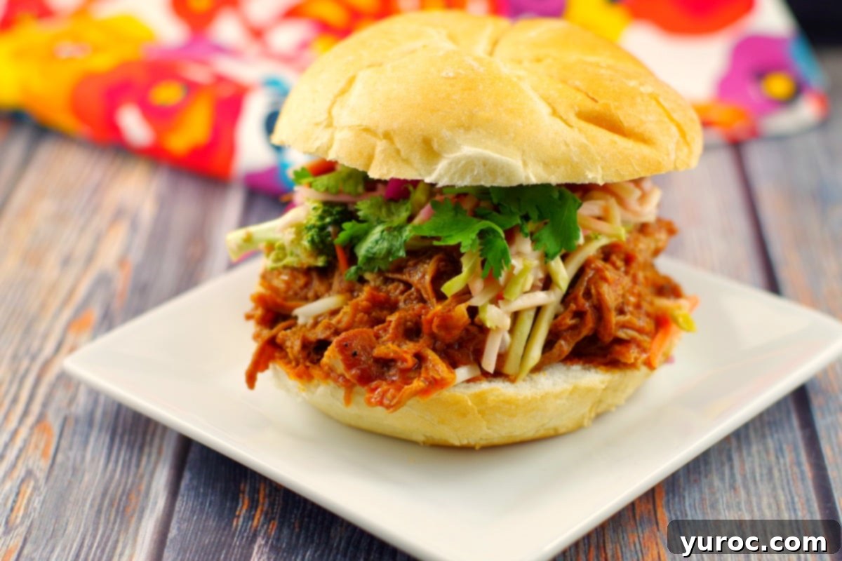 Slow Cooker Pulled Pork | #crockpotpulledpork #pulledpork - Foodmeanderings.com