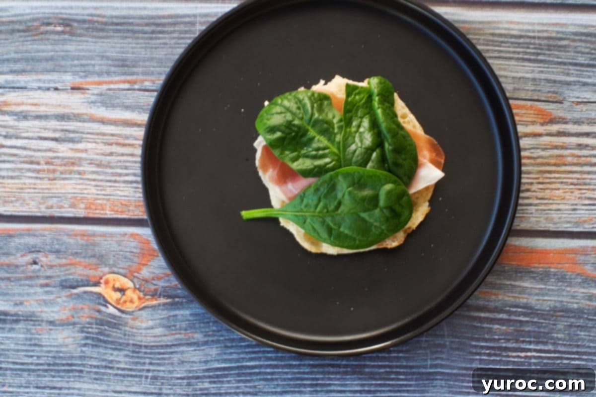 Spinach added to prosciutto