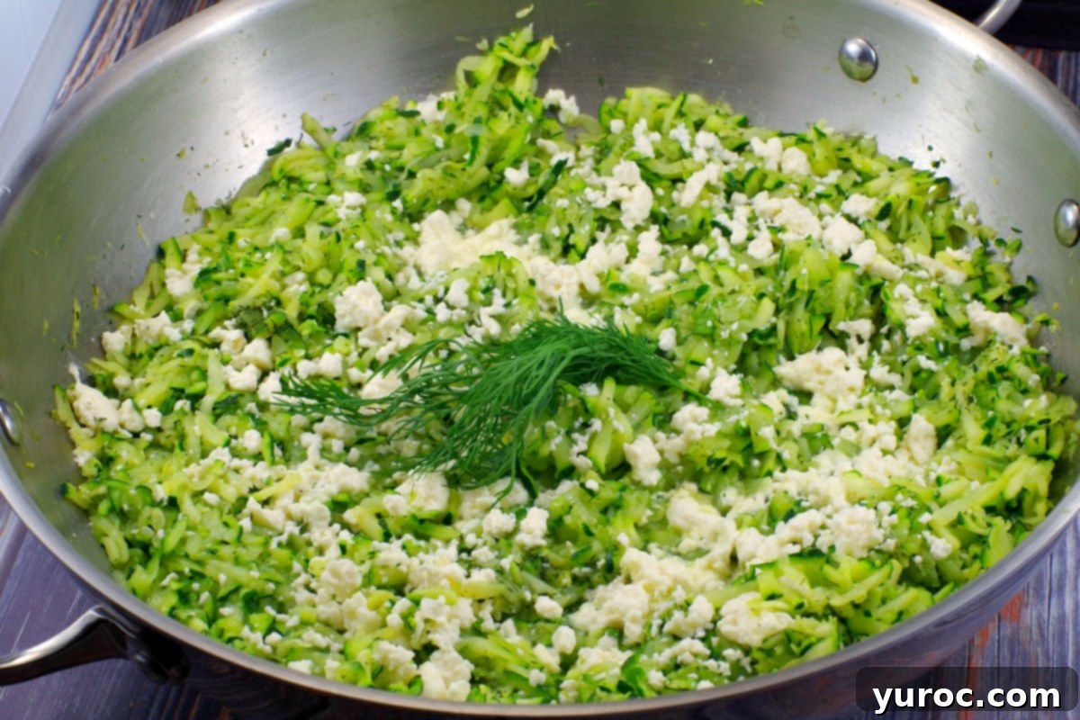 Golden Zucchini and Feta Skillet 5 Shredded Zucchini & Feta Saute | healthy - Foodmeanderings.com